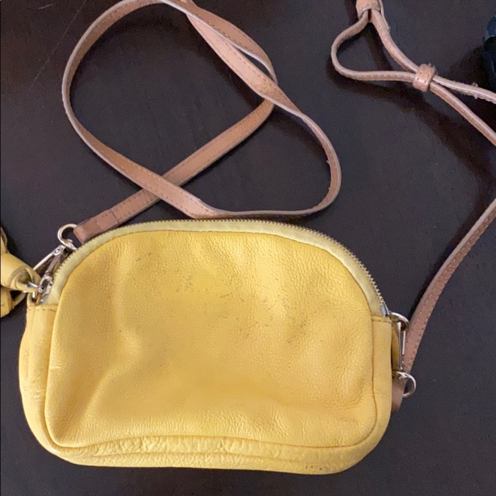 Neiman Marcus yellow small purse.